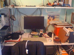 Yep, this is my desk at home, and it's so messy I don't really use it as a workspace much. Thank goodness for laptops